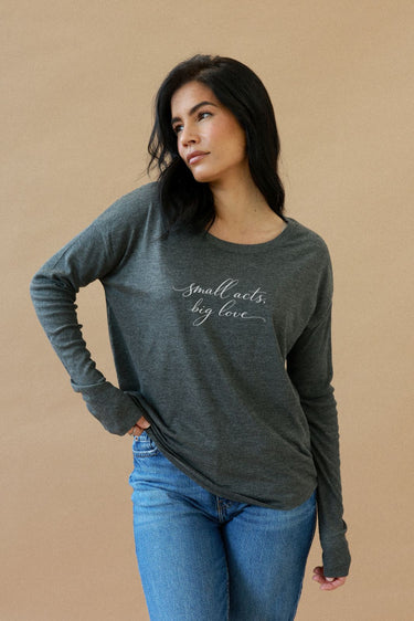 "Small Acts" Original Ribbed Long Sleeve Tee Cursive Front