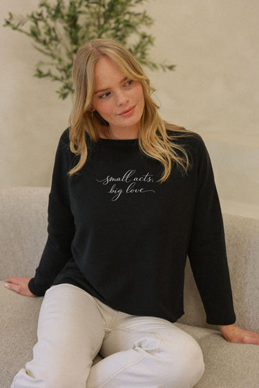 "Small Acts" Perfect Pullover Cursive Front