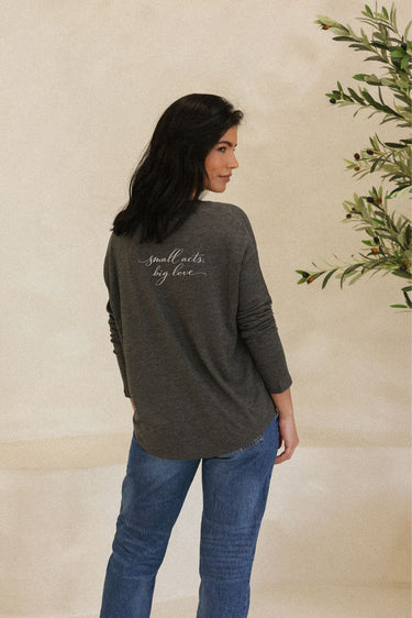 "Small Acts" Original Ribbed Long Sleeve Tee Cursive Back