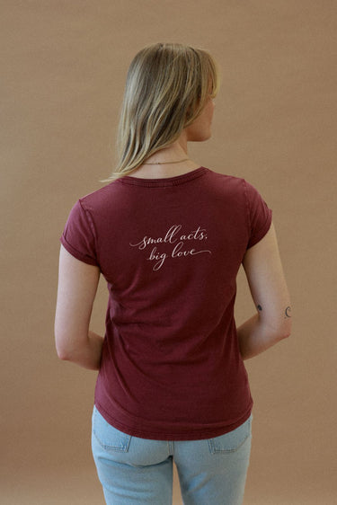 "Small Acts" Roll With It Tee Cursive Back