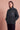 Signature Sherpa in Noir with the Om & Ah London logo, front view
