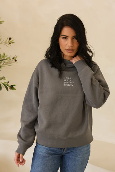 "Witch In Every Lifetime" Slumber Sweater Front