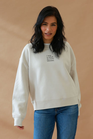 "Witch In Every Lifetime" Slumber Sweater Front
